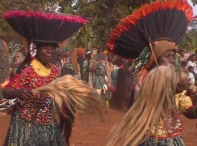 Juju Feather Hat Displayed On Stand - 20" Natural